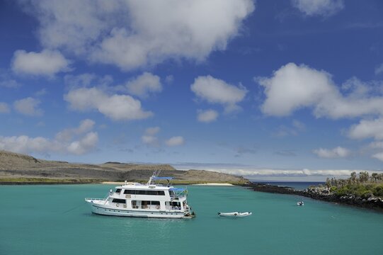 Boat in the snorkling paradise in the bay of Santa F&eacute; Island, Galapagos Islands, Ecuador, South America