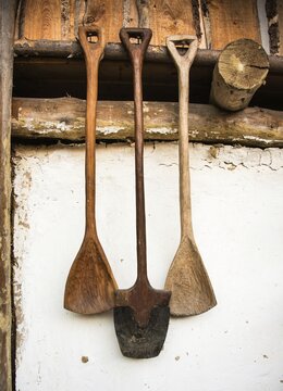 Medieval wooden spades hanging on a wall, chalet, Austria