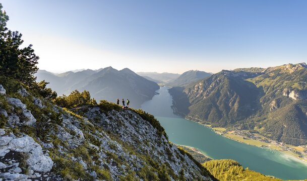 Friends at the summit, mountain panorama from B&auml;renkopf, Lake Achen, left Seebergspitze and Seekarspitze, right Rofan Mountains, Tyrol, Austria