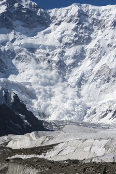 Avalanche coming down near Base Camp, Pabeda-Khan Tengry glacier massif, Central Tien Shan Mountain Range, Border of Kyrgyzstan and China, Kyrgyzstan