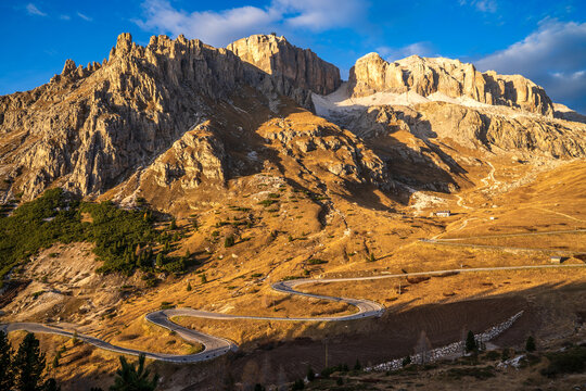 Scenic winding road of Pordoi Pass in the Sella Group, Dolomites, Italy