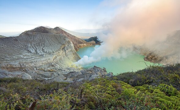 Volcano Kawah Ijen, volcanic crater with crater lake and steaming vents, morning light, Banyuwangi, Sempol, Jawa Timur, Indonesia