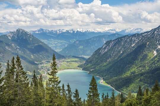 View of Lake Achen and snowy main chain of the Alps, spring, Tyrol, Austria