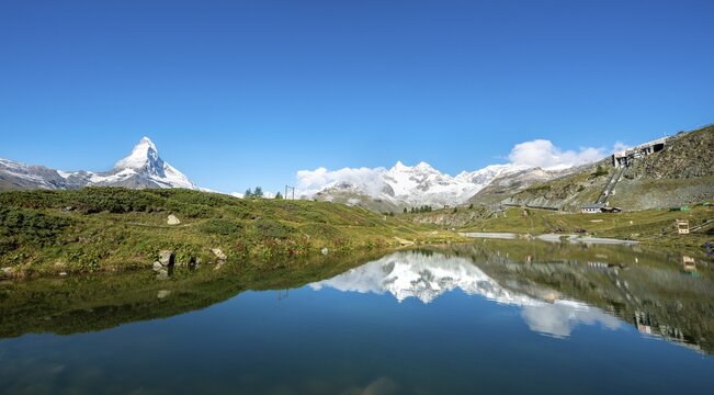 Matterhorn reflected in Lake Leisee, 5-lake hiking trail, Zermatt, Bernese Oberland, Switzerland