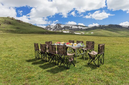 Pinic table at a camping site, Eki Naryn Gorge, Naryn Region, Central Tian Shan Mountains, Kyrgyzstan