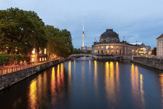 Evening mood, illuminated Bode Museum on the Spree, in the back Berlin television tower Alex, Museum Island, Berlin-Mitte, Berlin, Germany