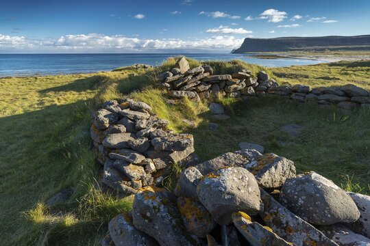 Derelict stone walls, remains of an old settlement, L&aacute;trav&iacute;k Bay, near L&aacute;trabjarg, West Fjords, Iceland