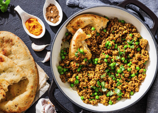Indian keema matar with minced meat, peas and naan
