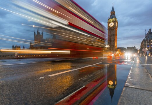 Light traces, double-deck bus, Westminster Bridge, Palace of Westminster, Houses of Parliament with reflection, Big Ben, City of Westminster, London, England, United Kingdom