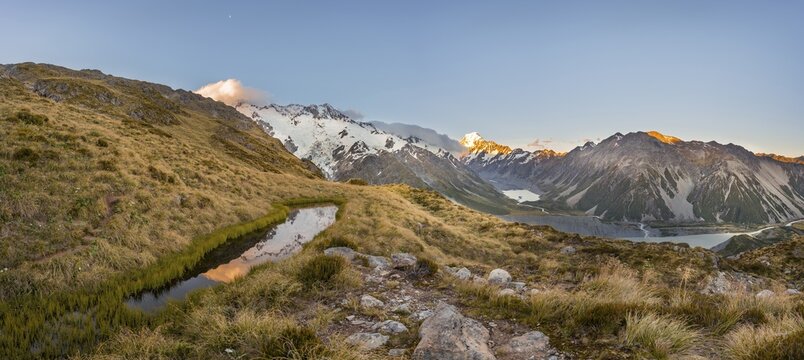Reflection in mountain lake, sunset at Mount Cook, Sealy Tarns, Hooker Valley, Mount Cook National Park, Southern Alps, Canterbury, South Island, New Zealand
