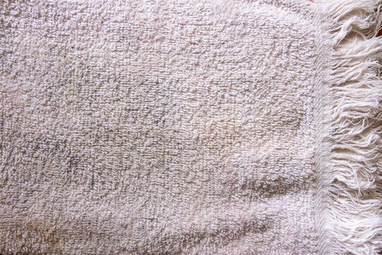 Kitchen cloth texture closeup with fringe detail