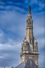 Fototapeta premium Sainte Anne Basilica Spire Against Blue Sky, Sainte Anne d'Auray, Brittany, France