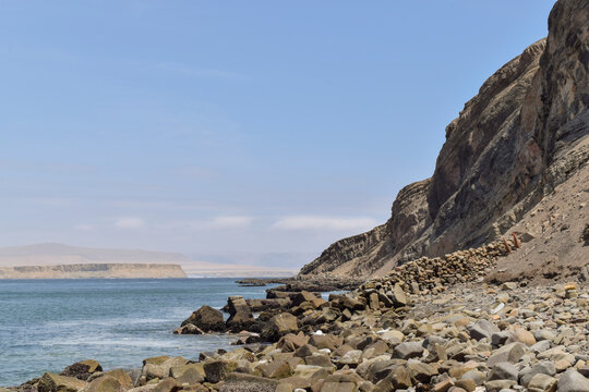 rocks in border sea in paracas peru