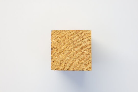 Cross section of engineered wood block showing texture and materials