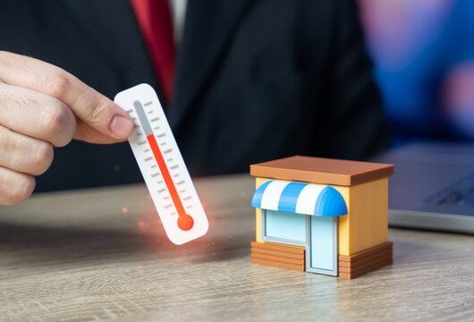 A man taking the temperature of a business. Investment climate and acceptable business conditions. Understanding store problems and optimizing business processes. Performance analysis