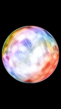 A radiant, multicolored sphere showcasing a complex chevron pattern that glows on a plain black backdrop.