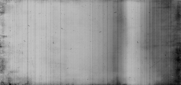 Old movie film with scratches dust and grain background texture black and white, vintage style