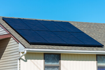Fototapeta premium new solar panels on the roof system