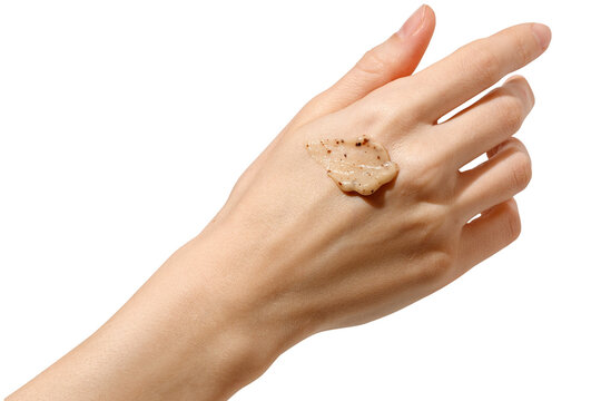  Woman Hand with smear of exfoliating scrub applied on the skin. Copy space. Transparent background. 