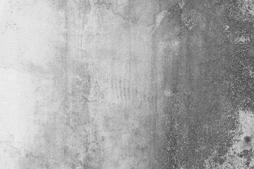Fototapeta premium Grungy gray stucco wall for aesthetic product backdrop.Rustic gray concrete wall texture with weathered surface.High resolution weathered stone texture for architectural mockup.