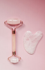Rose quartz facial roller and gua sha tool for skincare ritual, promoting self care and wellness routine