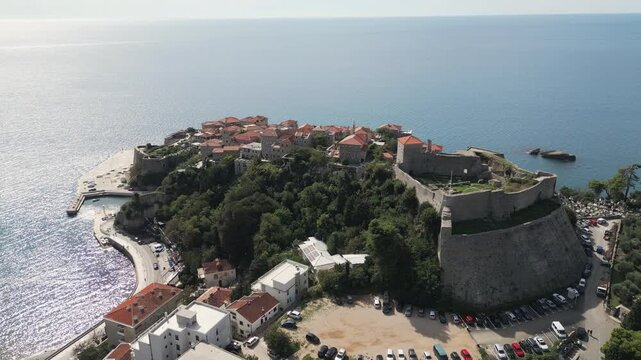Rotating drone shot revealing the medieval fortification located on the Adriatic coast in Ulcinj, Montenegro.