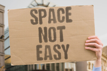 "Space Not Easy" Space is not an easy place to build anything — extreme temperatures, radiation, and microgravity make every task harder. SPACE. ORBIT. ENGINEER. FRAGILE. LIMITS. © AndriiKoval