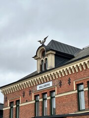 Obraz premium Architectural Detail of Hallsberg Train Station with Eagle Ornament Sweden