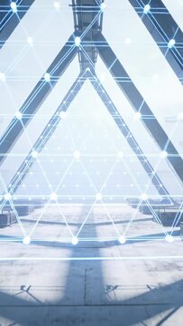 Vertical video: Crossing light beams sparking truss arch forming glowing triangular mesh on roof