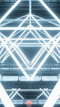Indicator pulsing, hung triangle lights growing, converging and revealing metal trusses and walkway