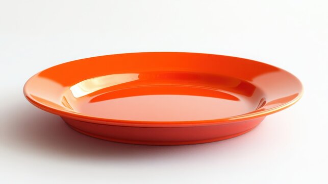 A vibrant orange ceramic plate on a clean white background