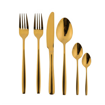 A set of shiny golden utensils on a table