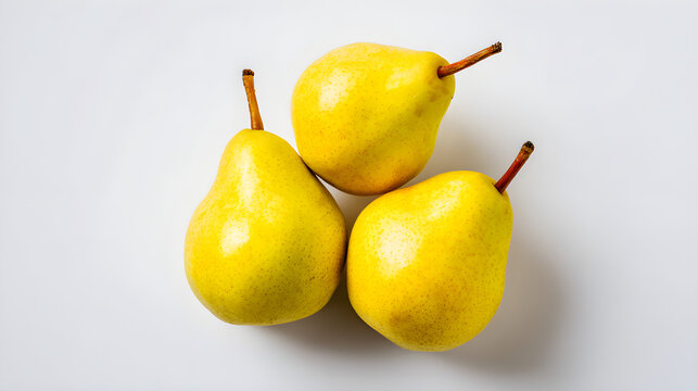 Three ripe yellow pears forming equilateral triangle on white background