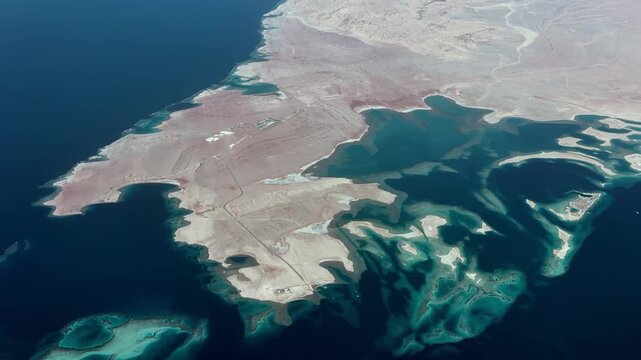 flying along Saudi Arabian coastline at Straits of Tirana which separates the Gulf of Aqaba from the Red Sea, with Ras Alsheikh Hamid an uninhabited desert headland  on western tip of Saudi Arabia