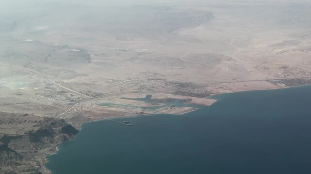 aerial landscape view of area around Ain Sokhna Port, a multi purpose hub port, situated in Ain Sokhna, Red Sea coastline, in the Suez Governorate of Egypt -4k aerial video footage