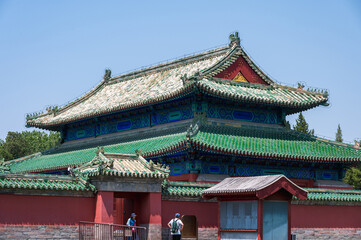 Obraz premium A bright sunny view of the Animal Sacrifice Pavilion within the Temple of Heaven complex in Beijing, looking out across a green lawn under a clear cloudless sky. Beijing, China - 27 May 2025