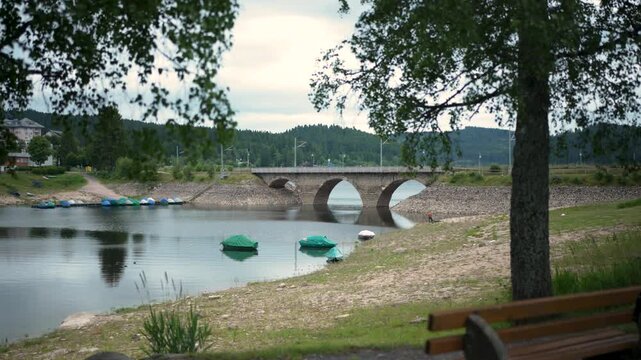 Schluchsee Blackforest Germany with Bench and stone Train Bridge