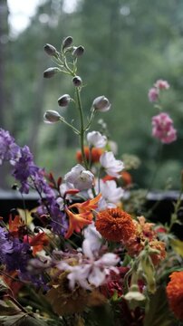 Vibrant floral bouquet with tagetes and scabiosa