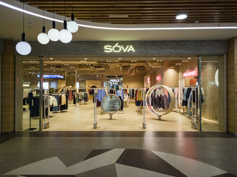 Izhevsk, Russia - February 26, 2026: SOVA clothing store entrance showcasing modern apparel displays and stylish interior design in a shopping mall environment