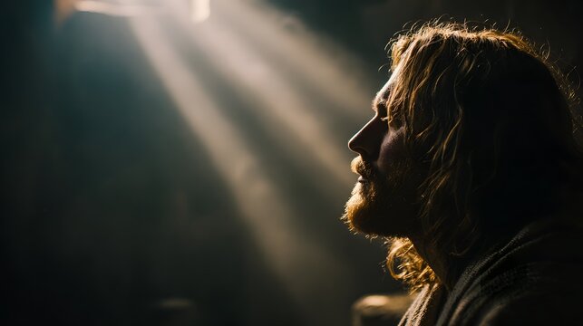 Christ speaking as light intensifies around his presence, environment reacting subtly to the spoken word, strong contrast lighting forming a halo of intensity, medium shot with a 50mm lens, cinematic 