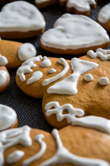 Fototapeta premium Homemade Gingerbread Cookies Decorated with White Icing