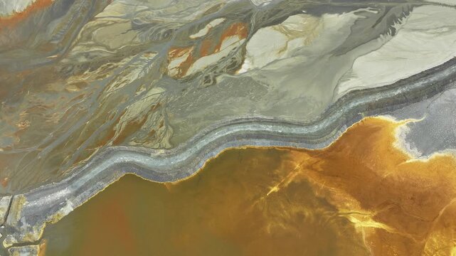 Abstract aerial view of colorful earth patterns in Huelva