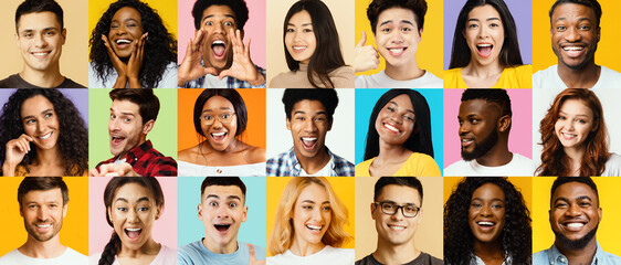 A millennial man stands in a bright orange studio and points at his credit card with a smile. He...