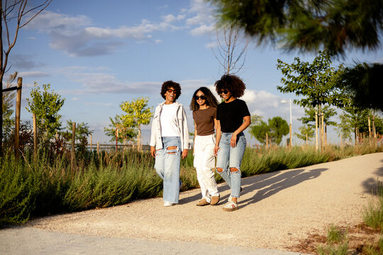Friends enjoying a walk on a sunny day
