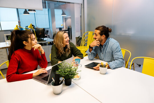 Collaborative coworkers in modern office space