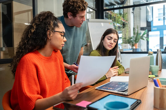 Multiethnic young professionals in coworking space