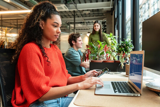 Multiethnic team working in modern office setting