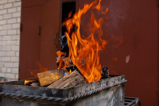 Captivating summer grill with blazing wood fire