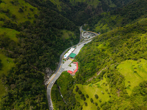 Aerial view of La Linea highway through lush mountains