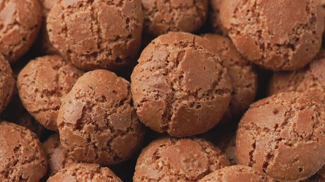 Amaretti biscuits, a traditional Italian sweet and crunchy almond cookies. Rotating video